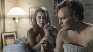 The Commune: Ulrich Thomsen e Trine Dyrholm in una scena del film