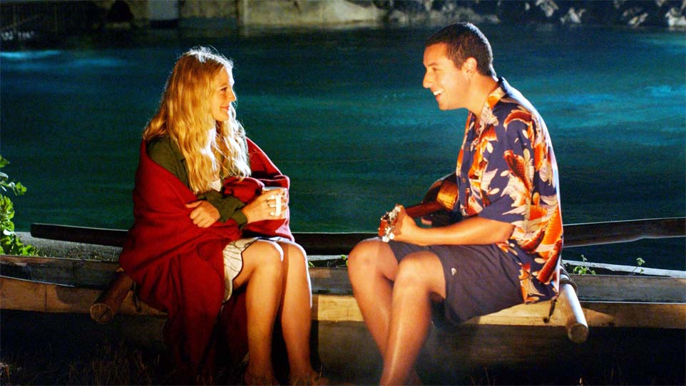 Drew Barrymore e Adam Sandler in una scena di 50 volte il primo bacio