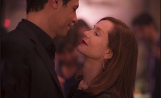 Elle: Isabelle Huppert e Laurent Lafitte in una scena del film