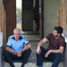 Dogs: Gheorghe Visu e Dragos Bucur in una scena del film