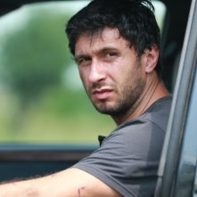 Dogs: Dragos Bucur in una scena del film