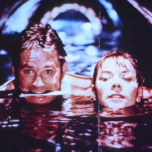 Grosso guaio a Chinatown: Kurt Russell e Kim Cattrall in una scena del film