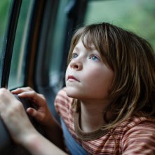 Il drago invisibile: Oakes Fegley in una scena del film