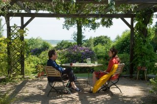The Beautiful Days of Aranjuez: Sophie Semin e Reda Kateb seduti in una scena del film