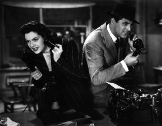 Rosalind Russell e Cary Grant ne La signora del venerdì