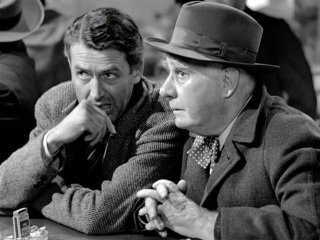 James Stewart e Henry travers in una scena de La vita è meravigliosa