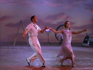 Debbie Reynolds e Gene Kelly in Cantando sotto la pioggia