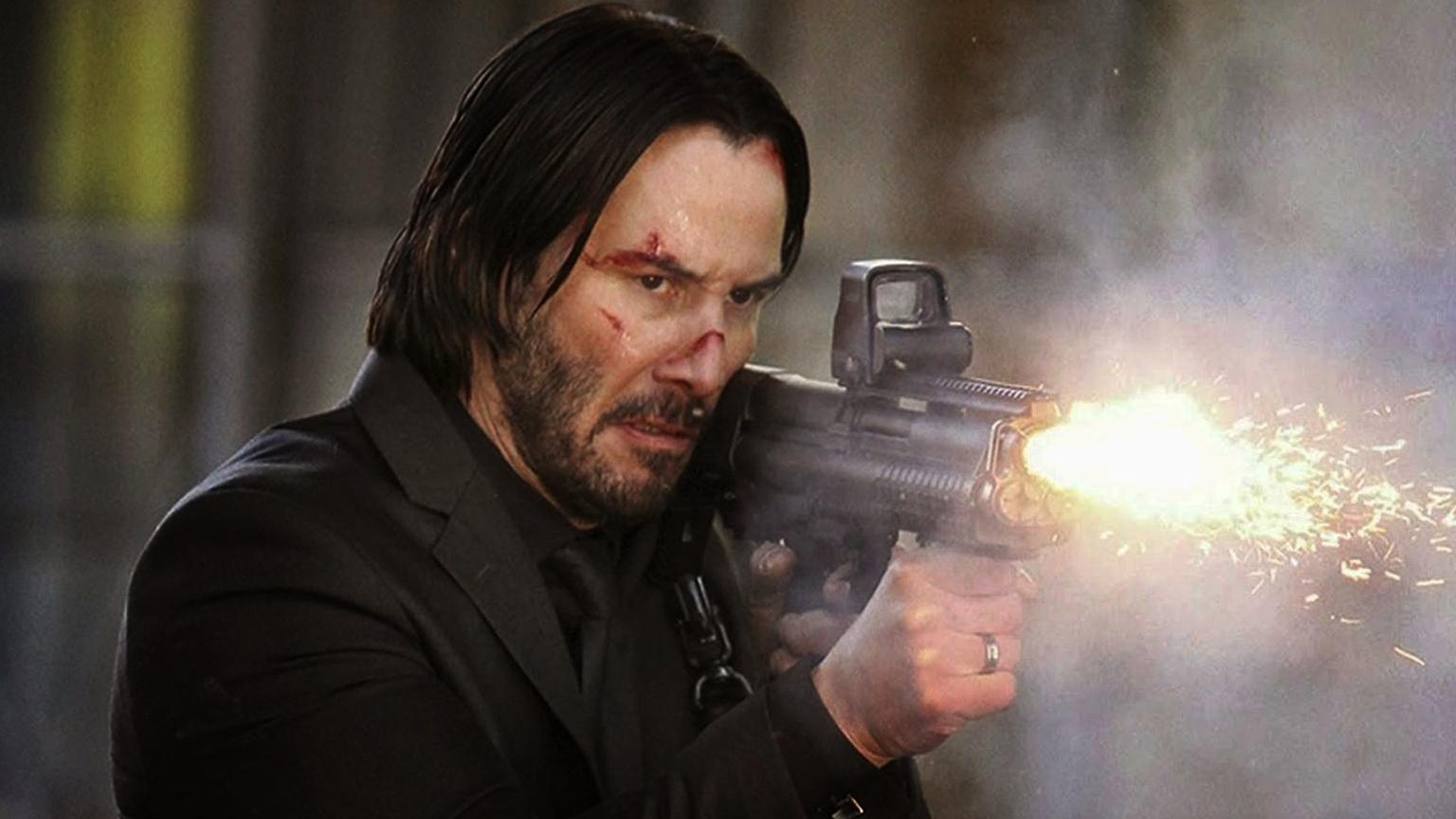 Keanu Reeves spara