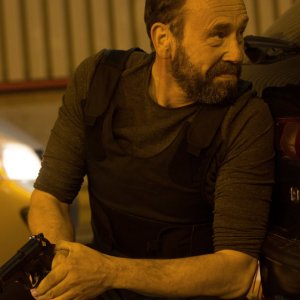 Tueurs: Oliver Gourmet in un momento del film