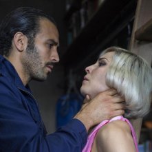 My Seven Sisters: Marwan Kenzari e Noomi Rapace in una scena del film