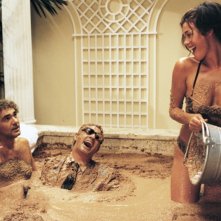 Super Vacanze di Natale: Megan Gale, Biagio Izzo e Massimo Giletti in una scena del film