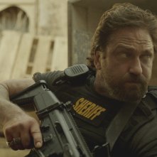 Den of Thieves: un primo piano di Gerard Butler in azione