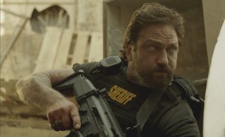 Den of Thieves: un primo piano di Gerard Butler in azione