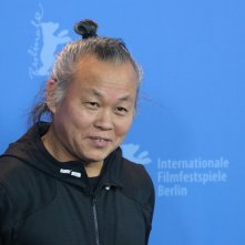 Berlino 2018: uno scatto di Kim Ki-duk al photocall di Human, Space, Time and Human 