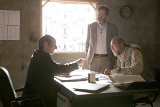 Io, Dio e Bin Laden: Nicolas Cage, Denis O'Hare e Rainn Wilson in una scena del film