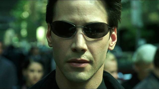 Primo piano di Keanu Reeves in Matrix
