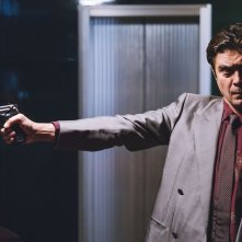 Lo Spietato: Riccardo Scamarcio in una scena d'azione