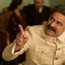 Raccolto amaro: Gary Oliver in una scena del film