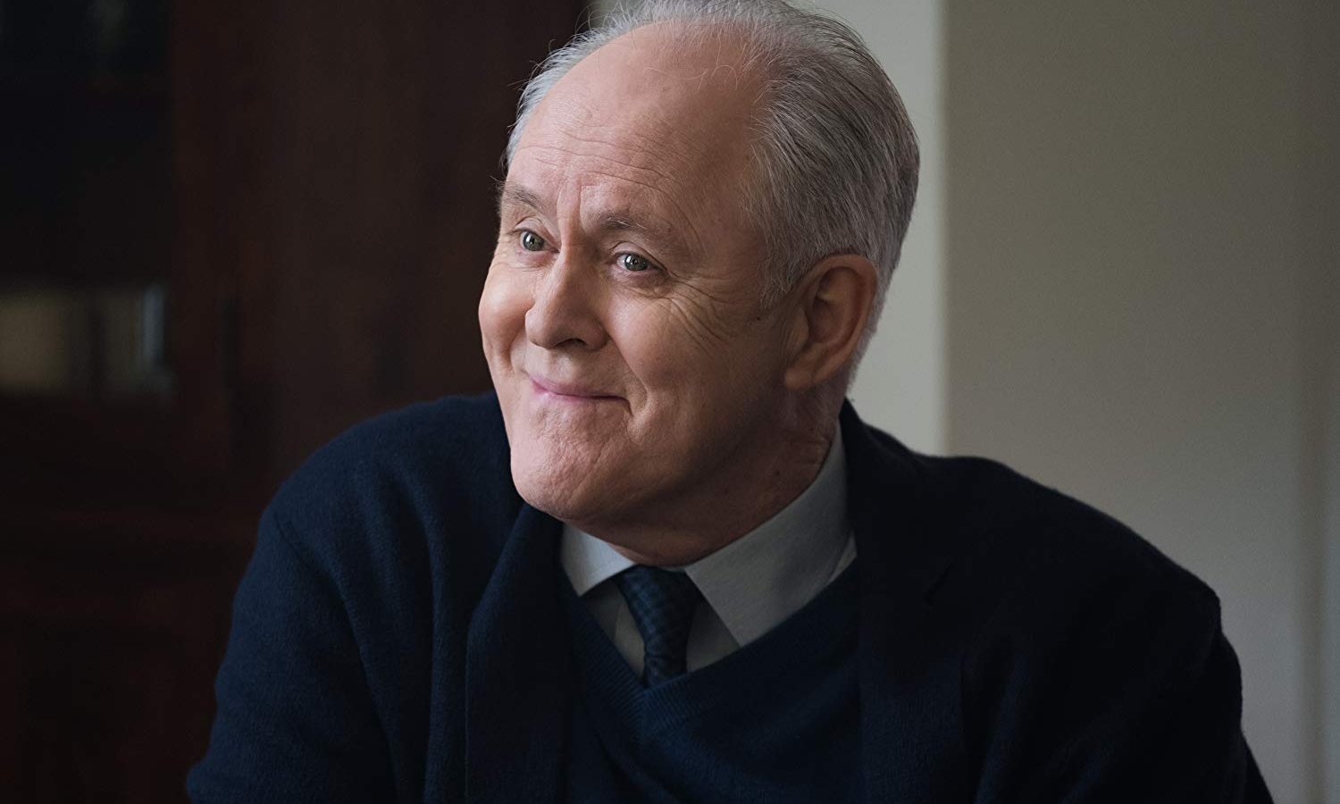 John Lithgow sorride