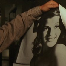 Le ali della libertà, Tim Robbins con il poster di Rita Hayworth