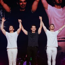 Happiness Continues: A Jonas Brothers Concert Film:  Kevin Jonas, Joe Jonas, Nick Jonas in una scena