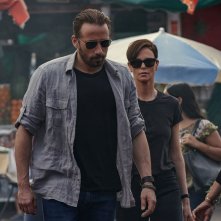 The Old Guard: Matthias Schoenaerts e Charlize Theron in una scena del film