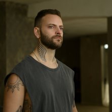 Suburra 3: Alessandro Borghi in una scena della terza stagione della serie Netflix
