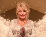 Natale in città con Dolly Parton: la cantante ha salvato una bambina durante le riprese