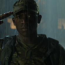 Outside the Wire: un primo piano di Damson Idris in una sequenza del film