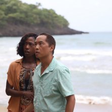 Old: Ken Leung insieme a Nikki Amuka-Bird in una scena del film