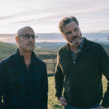 Supernova: Colin Firth con Stanley Tucci durante una scena del film