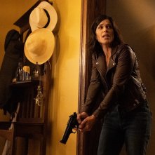 Scream: Neve Campbell durante una scena del film
