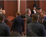 Amber Heard sussulta quando Johnny Depp le si avvicina in tribunale (VIDEO)