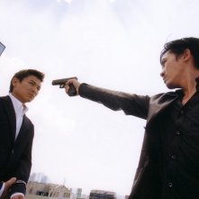 Infernal Affairs: Andy Lau e Tony Chiu-Wai Leung in una scena del film