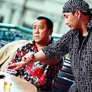 Infernal Affairs II: Eric Tsang in una scena del film