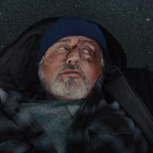 Samaritan: un primo piano di Sylvester Stallone a terra