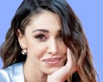 Belen Rodriguez, lite in aeroporto con i fotografi: interviene la polizia