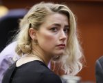 'Amber Heard è indifferente alla relazione di Johnny Depp con il suo avvocato', svela una fonte