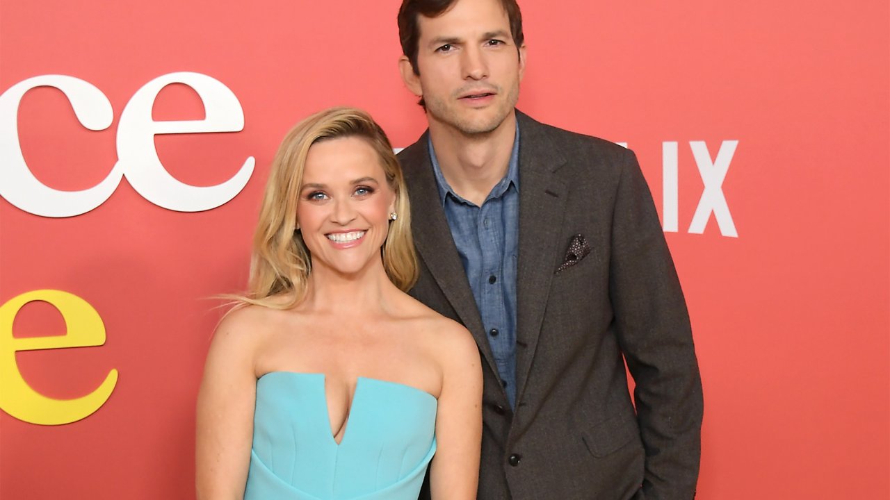 Ashton Kutcher explains the "sides" photo with Reese Witherspoon on the red carpet of My Place or Yours