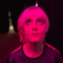 Headshot: Demetra Bellina in una scena del film