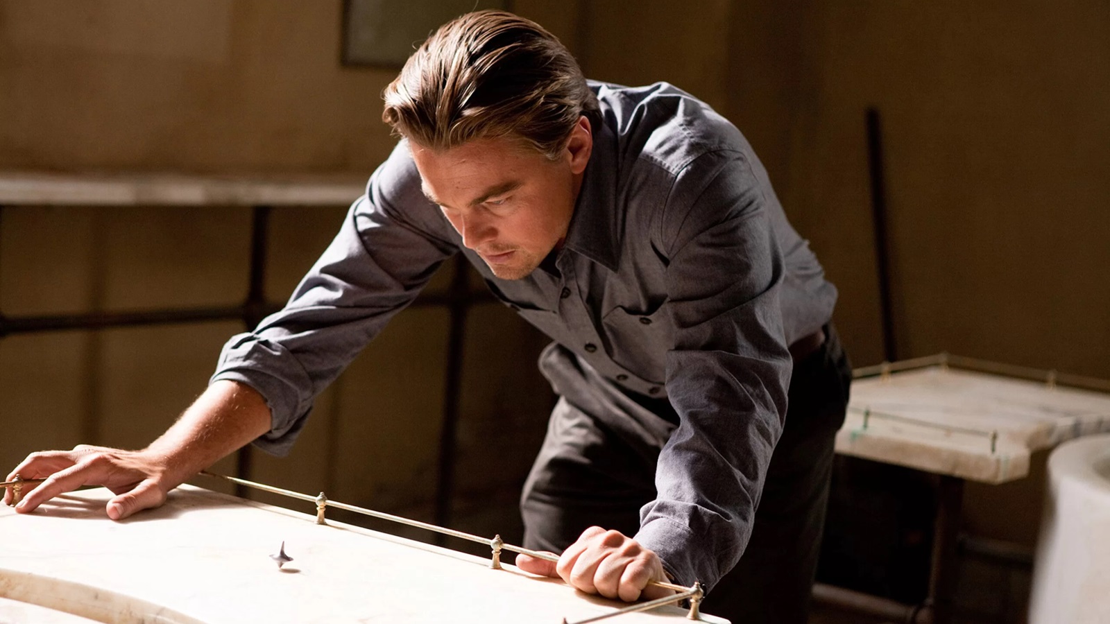Early on, Christopher Nolan reveals his favorite answers to questions about the ending