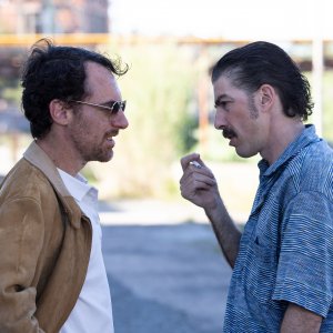 Palazzina LAF: Michele Riondino con Elio Germano in una foto del film