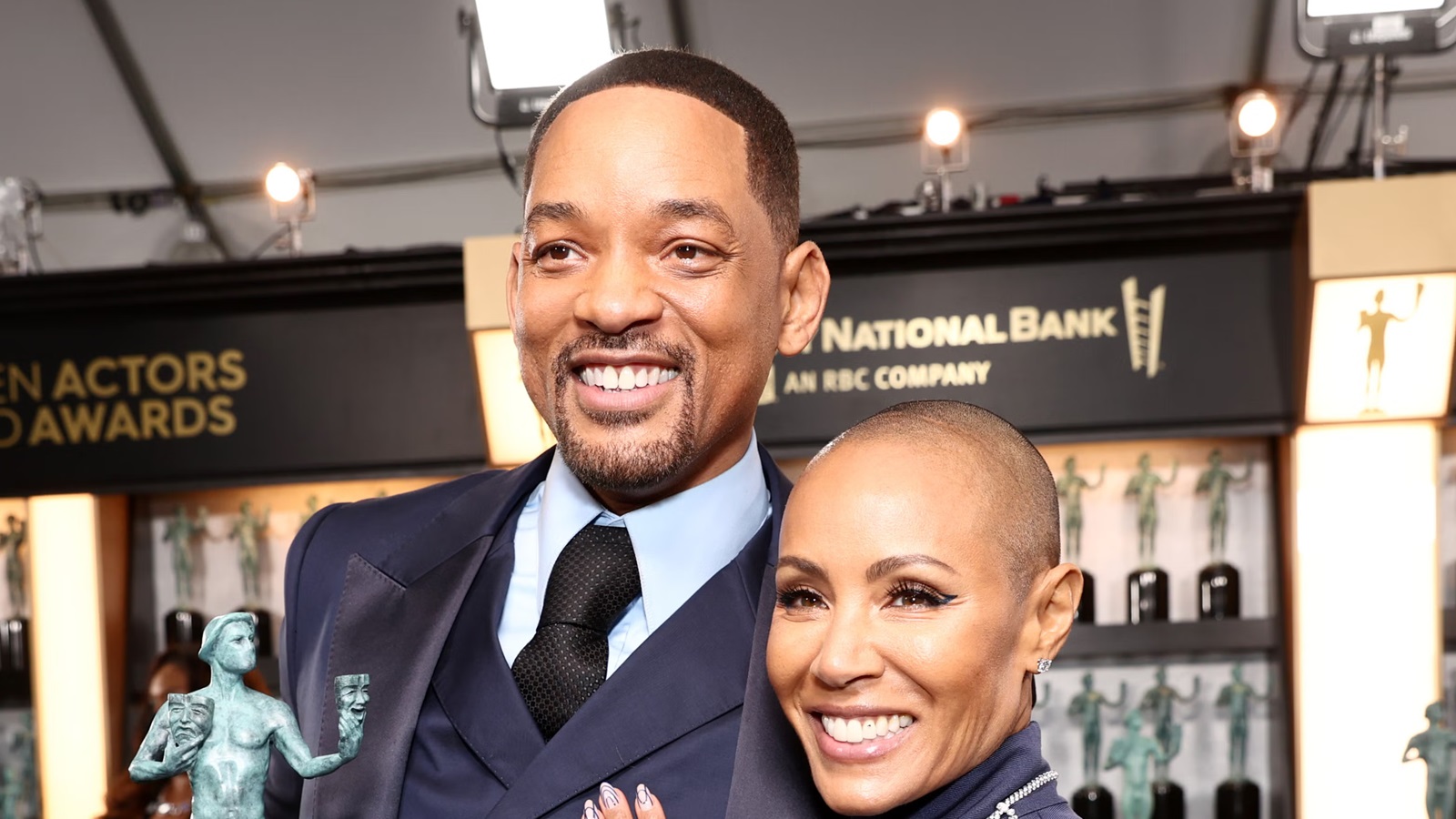Will Smith made a surprise appearance to support his wife Jada at the launch of her memoir.