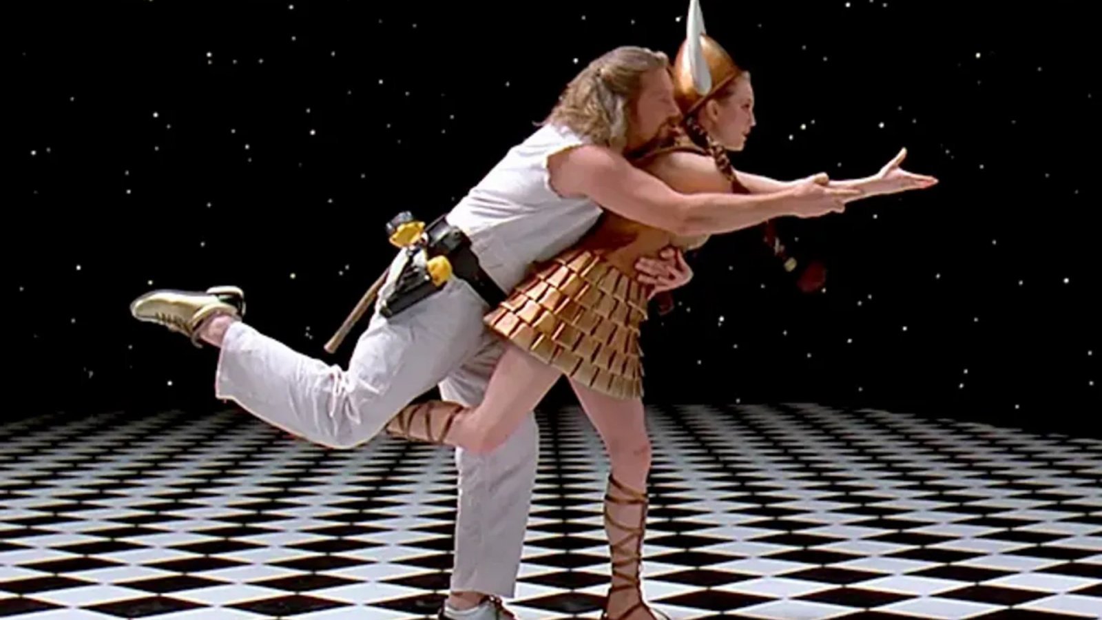 Jeff Bridges e Julianne Moore in una scena de Il grande Lebowski