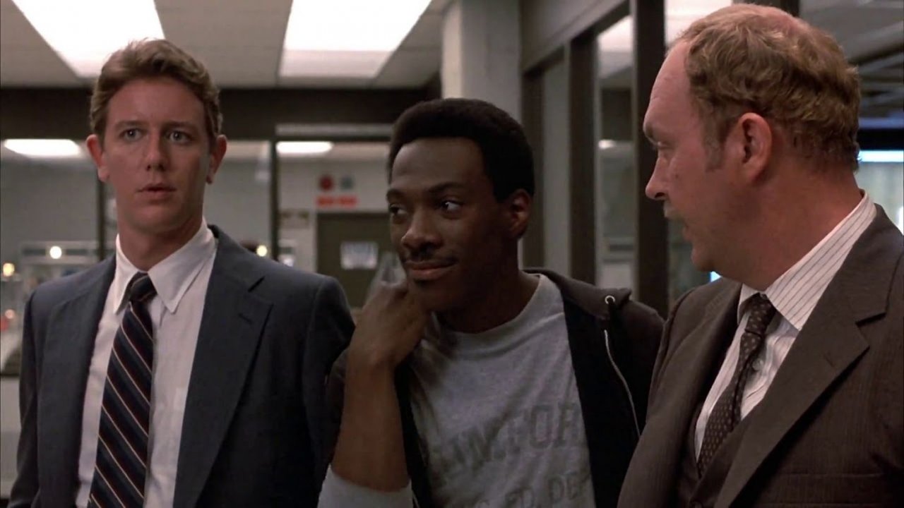 Judge Reinhold, John Ashton e Eddie Murphy in una scena del franchise Beverly Hills Cop