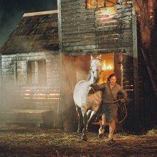 Harvest: Caleb Landry Jones in una scena del film