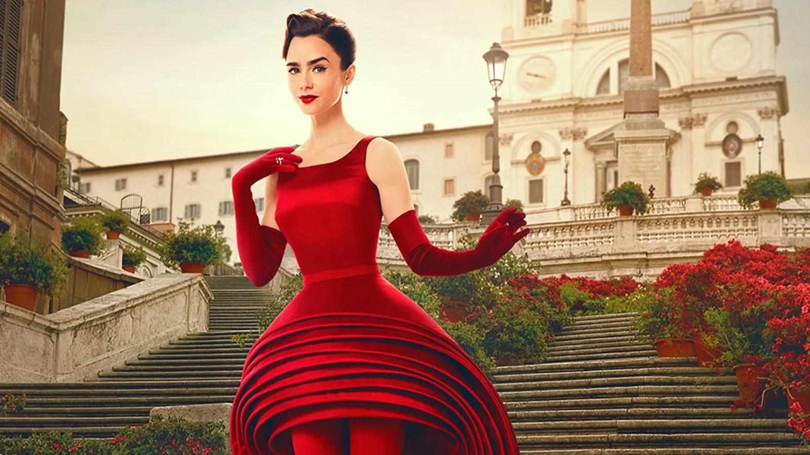 Lily Collins sulle scale di Piazza di Spagna.