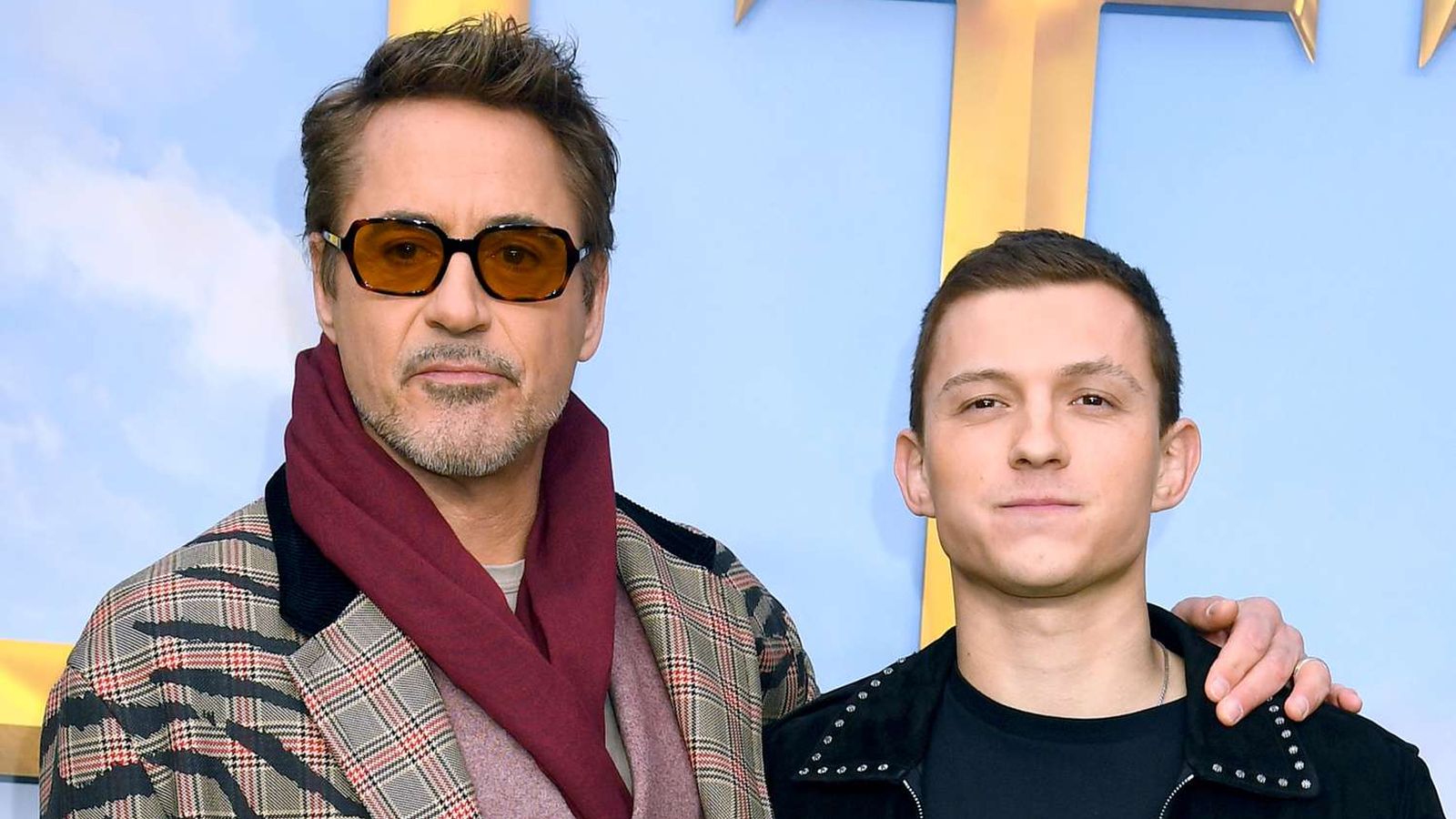 Tom Holland e Robert Downey Jr.