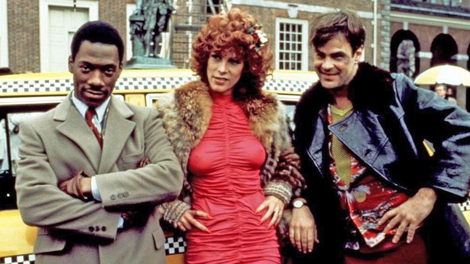 Eddie Murphy, Jamie Lee Curtis e Dan Aykroyd sul set di Una poltrona per due