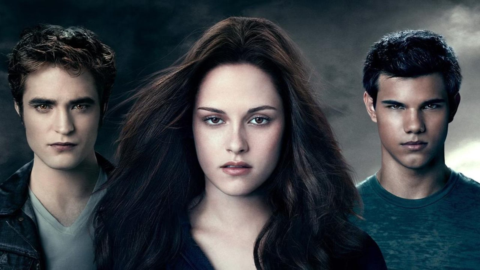 Twilight: Robert Pattinson, Kristen Stewart e Taylor Lautner in un banner ufficiale